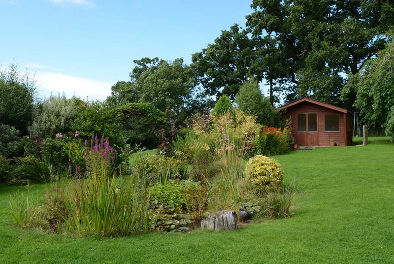 Guests have sole use of the summer-house. It faces south to make the most of the sunshine and views across the fabulous garden and the little pond; please take care if you have small children with you.