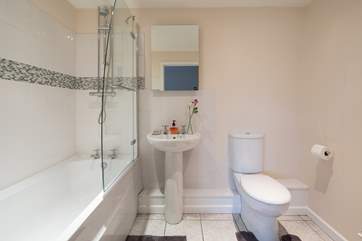 The en suite bathroom for bedroom 1 with a heated towel rail for toasty warm towels.