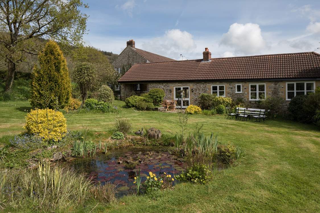 Stable Cottage has French doors that lead out onto a wonderful and really large, lawned garden. The feature pond attracts some amazing birds - do take care with small children though. 