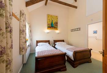 This is the twin bedroom with its lovely sleigh beds and en suite shower-room.