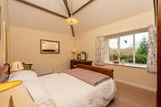 The master bedroom is another wonderfully sized room, over looking the garden. Now with a new bed.