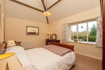 The master bedroom is another wonderfully sized room, over looking the garden. (new bed for 2021 - new image to follow)