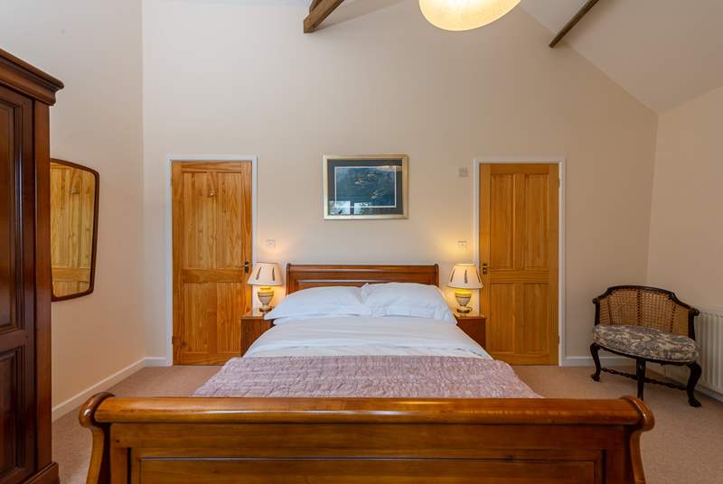 The bedroom is super spacious, with a new bed in place for 2021 – new image to follow.  The en suite bathroom is through the door to the right of this photo.