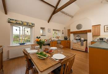 This friendly cottage has a really spacious kitchen/dining-room that looks out over the large level gardens.