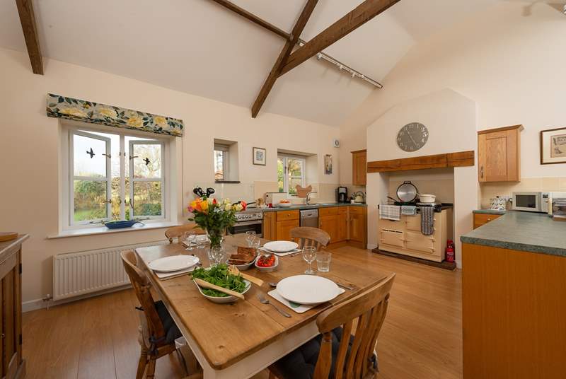 This friendly cottage has a really spacious kitchen/dining-room that looks out over the large level gardens.