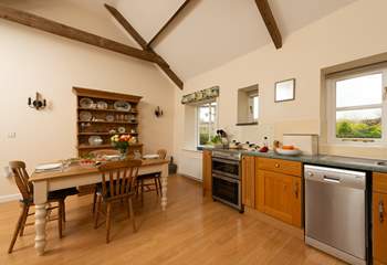 The kitchen/dining-room is an excellent size for a cottage that accommodates four guests.