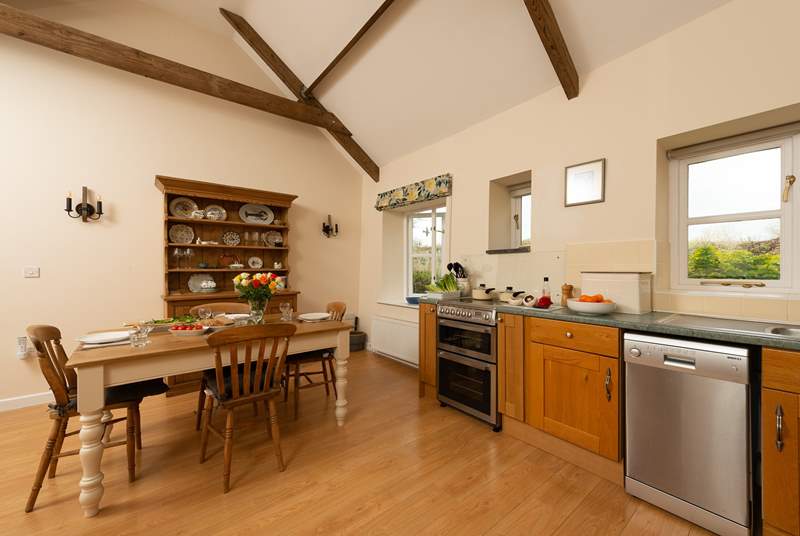 The kitchen/dining-room is an excellent size for a cottage that accommodates four guests.