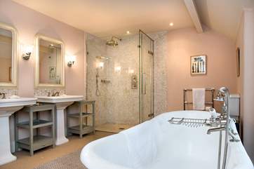 This bathroom has a wonderful free-standing bath.