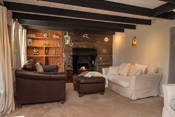 The sitting-room has plenty of space to spread out.