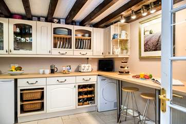 You can access the conservatory from the kitchen.