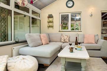 The conservatory invites you to snuggle up with a good holiday read.