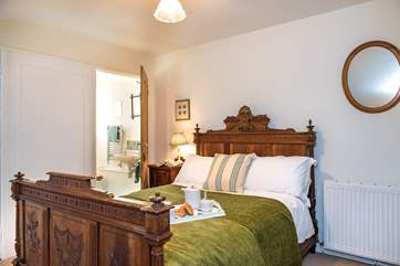 Bedroom 3 has a lovely antique French bed and en suite facilities.