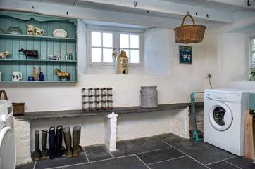 Wooda's dairy can still be used for storing food, but is also a useful utility-room.