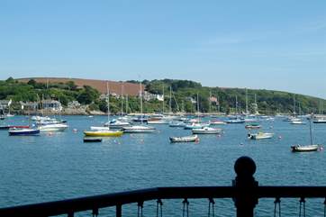 Watch the yachts on their moorings from the balcony.