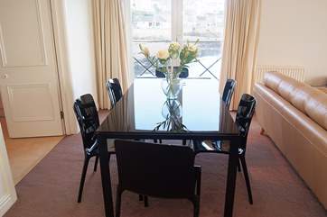 The dining-area looks out towards the Royal Cornwall Yacht Club.