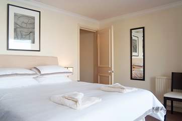 The master bedroom has a 5' double bed (Bedroom 1).
