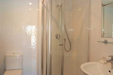 This shower-room is en suite to Bedroom 1.