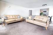 The open plan living space opens to the kitchen  - plenty of space for everyone.