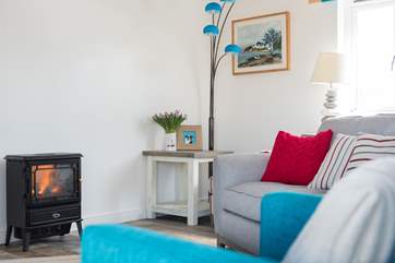 Snuggle up in front of the electric fire.