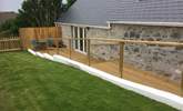 The private garden and terrace is a sunny spot with countryside views. - Thumbnail Image