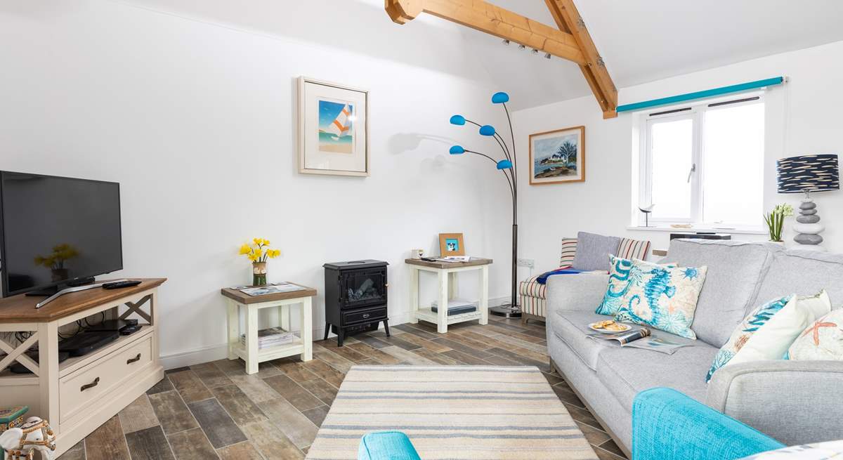 Beautifully furnished in pastel shades with pops of colour in a nautical theme.