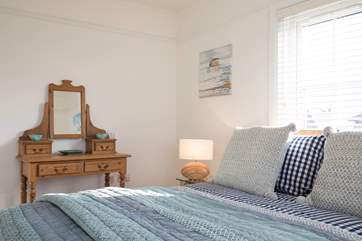 The large master bedroom has a lovely dressing-table.
