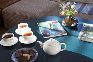 Time for a cuppa and a biscuit. Alternately pour a coffee from the Nespresso coffee machine.