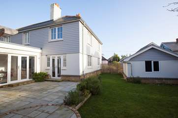 The garden is fully enclosed, perfect for children and a pet to run around freely.