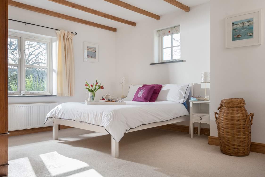 The main bedroom where the morning sun shines through.