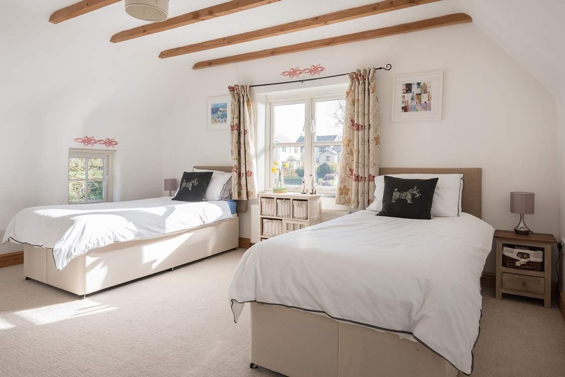 The charming twin bedroom.