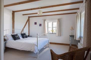The spacious double bedroom has lovely feautures.