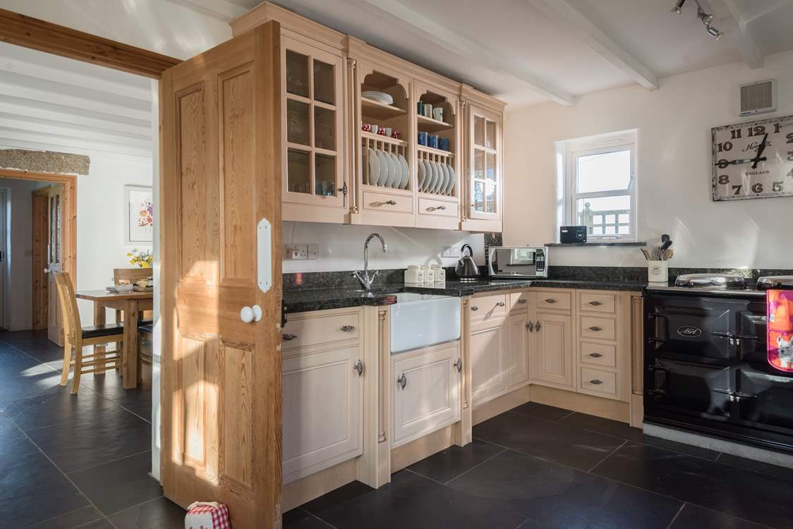 The kitchen is well-equipped and joins the dining-room. There is a four ring electric hob and combi-microwave oven if you are unsure of the AGA.