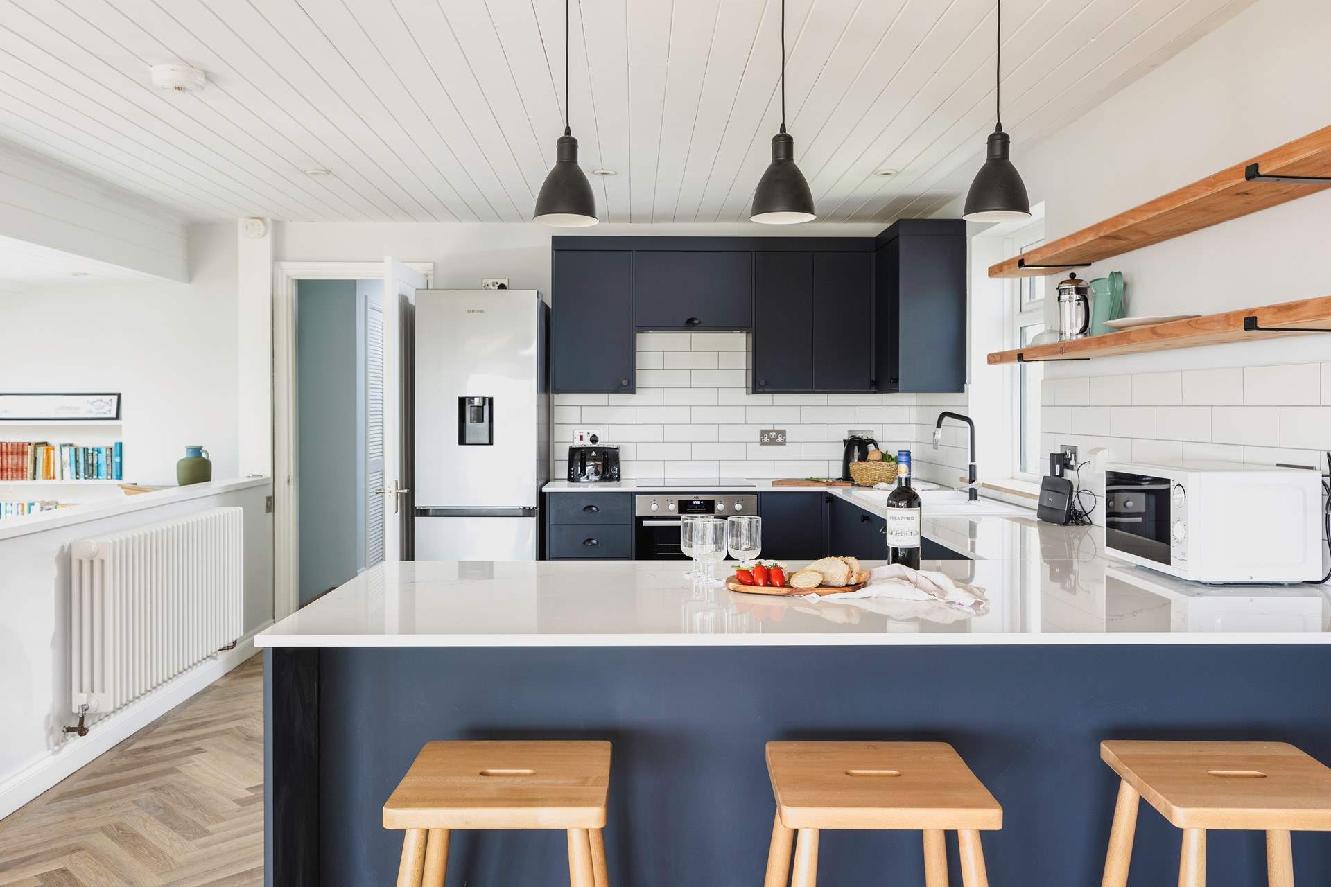 The well-equipped kitchen offers plenty of space to whip up a feast.