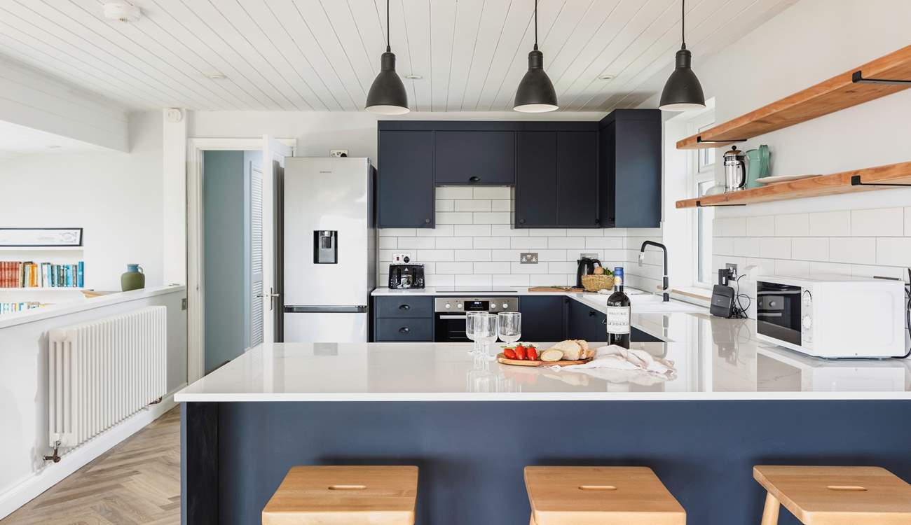 The well-equipped kitchen offers plenty of space to whip up a feast.