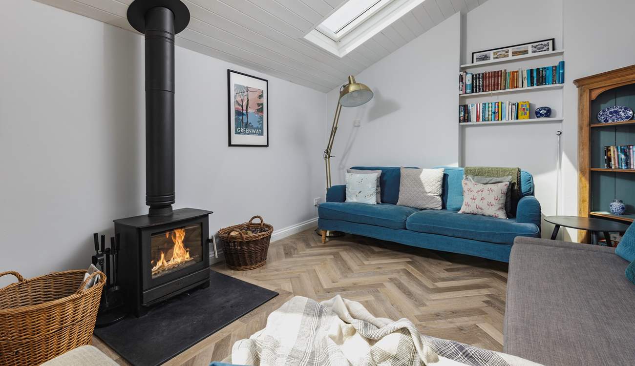 The living-area has a fabulous wood-burner, which sets the perfect scene for cuddling up and enjoying a cosy night in.