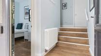 Please take care as these stairs lead up to the higher level of the house and are narrower than standard.