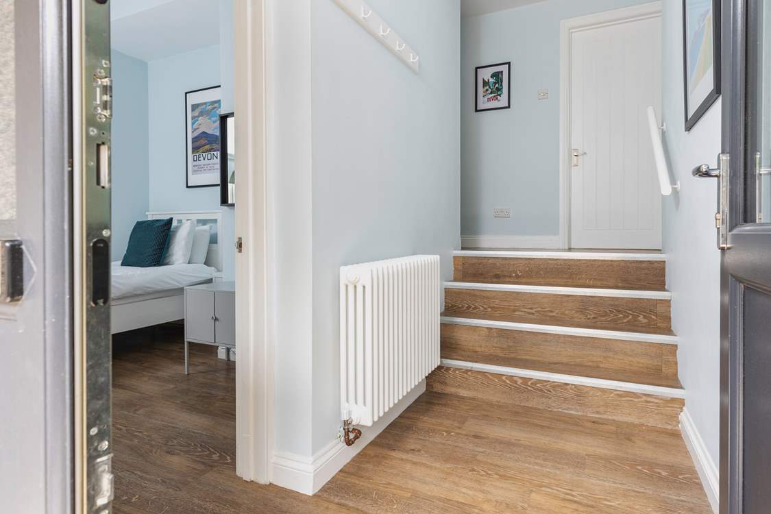 Please take care as these stairs lead up to the higher level of the house and are narrower than standard.