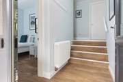 Steps which lead up to the higher level of the house. Please take care as these stairs are narrower than standard steps.