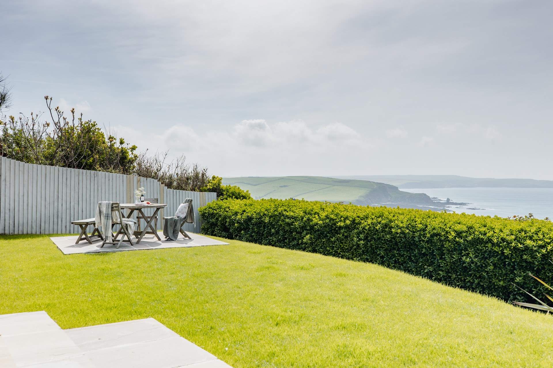 Relax in the sunshine and gaze out to sea.