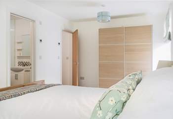 The gorgeous master bedroom with en suite bathroom.