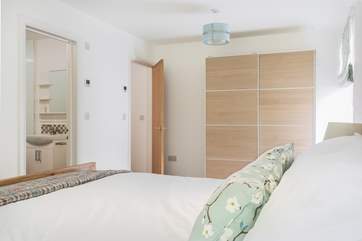The gorgeous master bedroom with en suite bathroom.