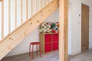 Under the stairs is a little play area perfect for the toddlers.