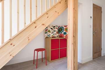 There's a play area under the stairs, perfect for the little ones.