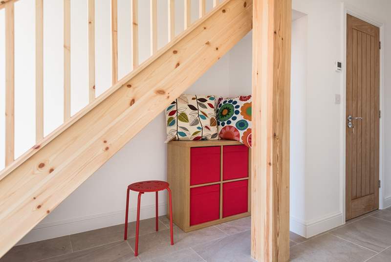 There's a play area under the stairs, perfect for the little ones.