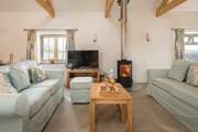 When the weather is not so good sit around the cosy wood-burner and enjoy the glow. Under-floor heating will also keep you warm.