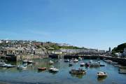 Pretty Porthleven harbour is only five miles away. This 'foodie' place has lots of cafes, restaurants and quaint shops.