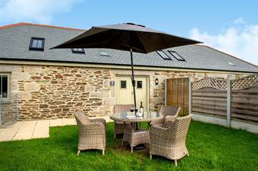 Enjoy sunny meals outside surrounded by farm land.