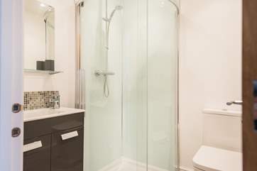 The en suite shower-room has a large corner shower cubicle.