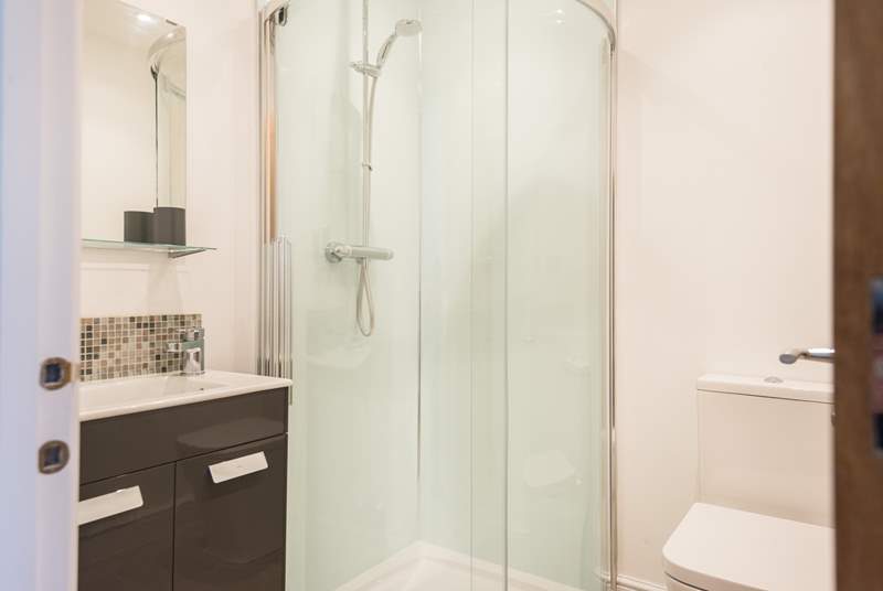The en suite shower-room has a large corner shower cubicle.