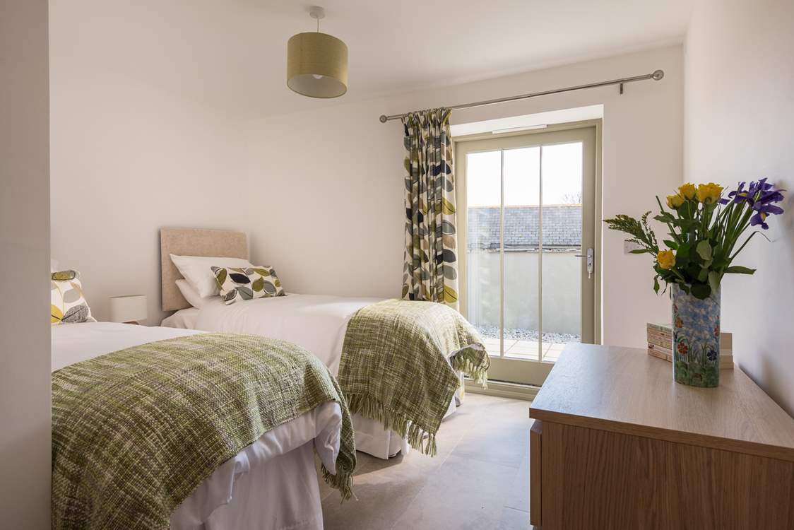 This bedroom can be made up as a king-size double bed or two singles, 2ft 6in suitable for children.